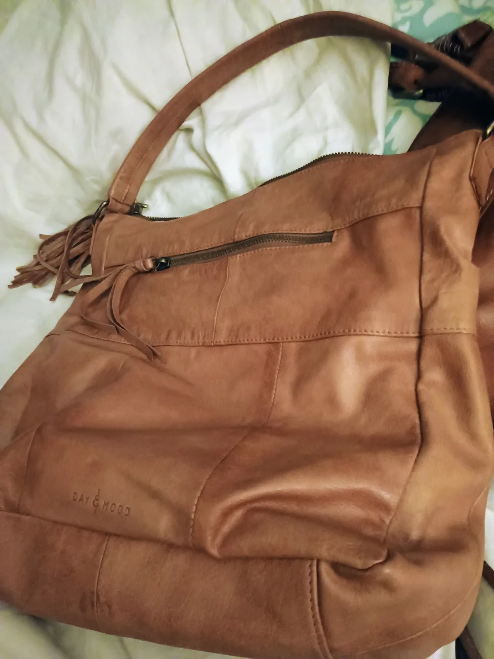 ANTHROPOLOGIE!! LEATHER TAN W/TASSELS!! 14 IN X 14 IN